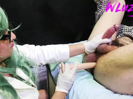 doctor performs anus exam whith lengthy sex toy