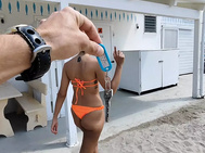 She takes me to the toilet of the beach ban to have her arsehole opened, then she jerks me off until I spunk